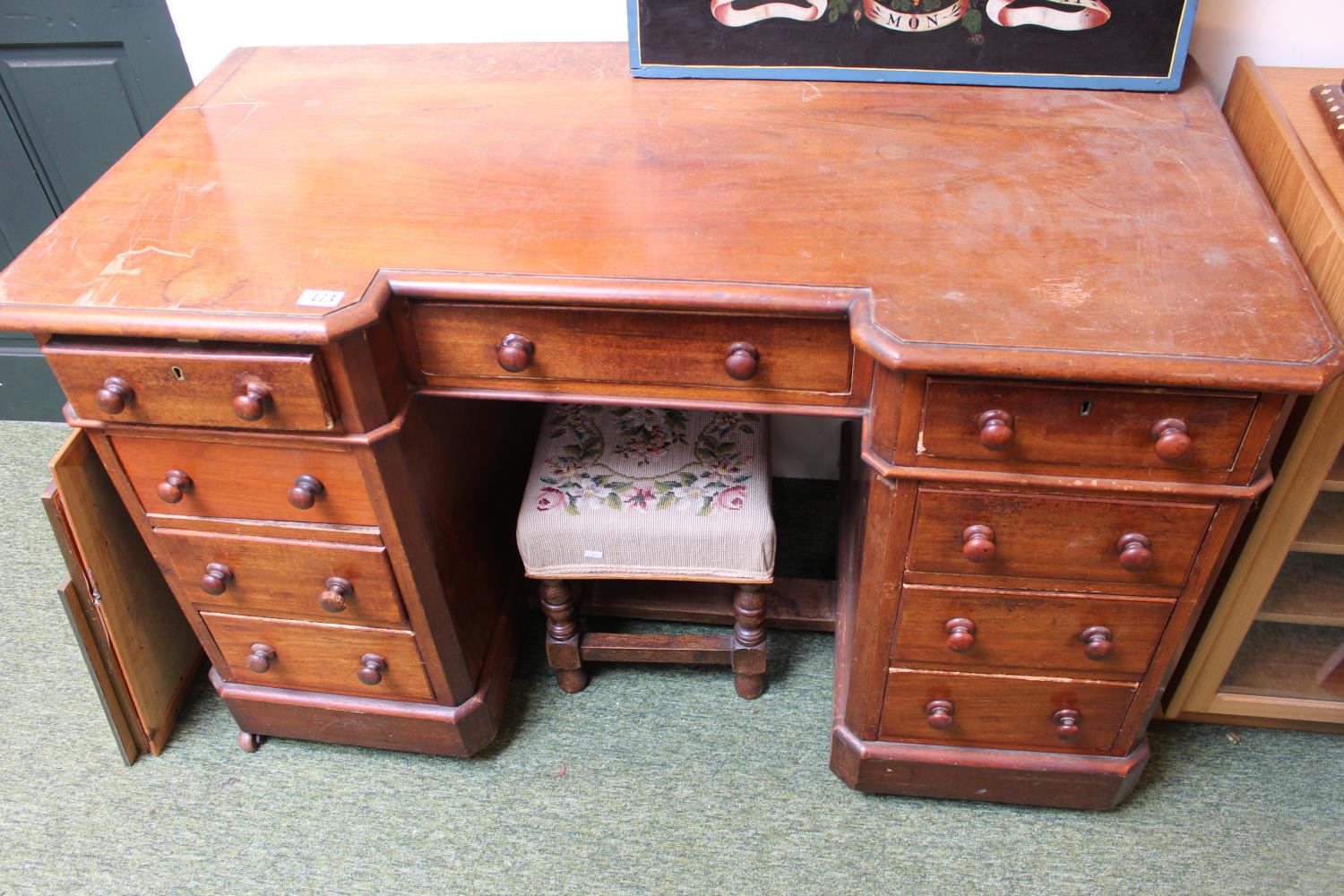 Victorian breakfront pedestal desk of 9 drawers with turned handles. 124cm in Width