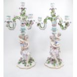 Pair of Edwardian Hard Paste Porcelain Continental Candelabra of three branches over figural base