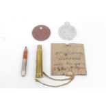 1914 Princess Mary bullet pencil, Dog tags and a label from a WWI gas mask
