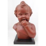A Terracotta bust of a young child with impressed mark to reverse R. Scali and numbers 161, 31.5cm