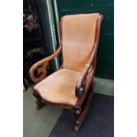 Victorian upholstered rocking elbow chair with Walnut frame