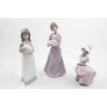 Lladro figure of a Woman with Rabbit and 2 other Lladro figures