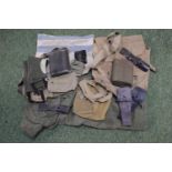 Large collection of Military webbing and leather equipment pouches, bayonet holders, kit bags etc
