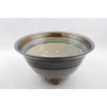 Bernard Rooke pierced draining bowl on paw feet with banded rim 29cm in Diameter