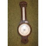 Edwardian Oak cased Aneroid Barometer with carved detail