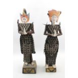 Pair of Ceremonial Balinese coin figures with Hand Painted decoration. 44cm in Height