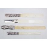 Collection of 4 Silver handled Ivory page turners inc. Edward Barton London 1912, E Blumenstein & Co