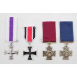 Collection of 4 Reproduction Medals inc. German Iron cross, Victoria Cross Naval and Army, and