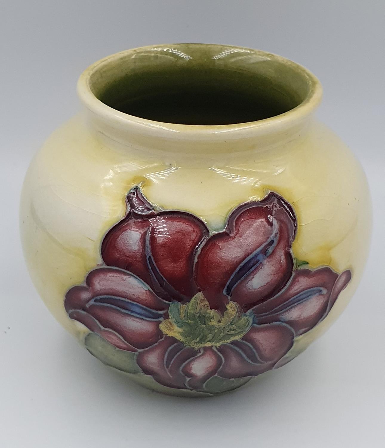 Moorcroft Clematis on Green ground pattern Squat vase with impressed blue mark to base. 7cm in