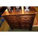 18thC Oak cabinet with panel doors and castile moulding with later alterations. 88cm in Width