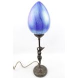 20thC Cast Bronze figure of a Nude with Blue glass lustre shade. 50cm in Height