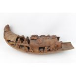 A large Chinese carved bamboo boat, decorated with fishermen unsigned. 44cm in Length