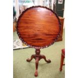 20thC Mahogany tilt top bird cage table on tripod paw feet