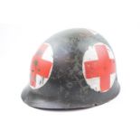 Original WWII M1 Medics Helmet with webbing to interior with overshell and netting