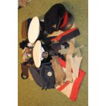 Military hats and various clothing items