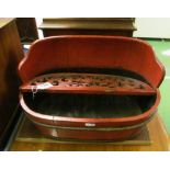 A Japanese red lacquer trough with pierced shelf (s/a/f)