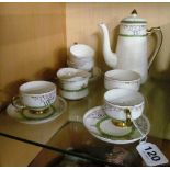 A Savoy china coffee set:- coffee pot (spout a/f), four saucers, four cups (one chipped), sucrier