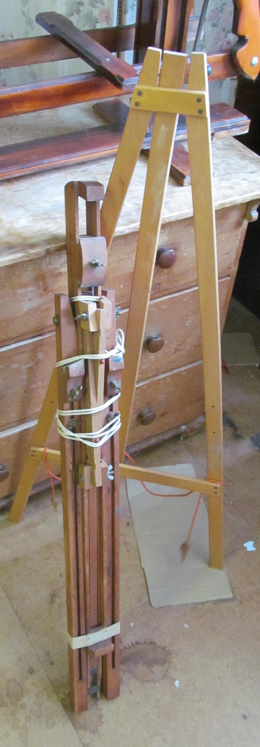 A folding easel and another small easel