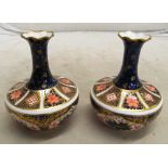 A pair of Royal Crown Derby vases