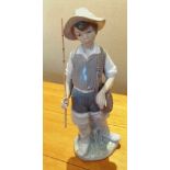 A Lladro figure Fisherboy No 4809 retired 2002 modelled by Salvador Furio