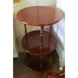 A three tier mahogany table