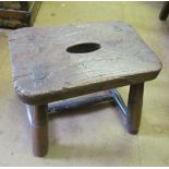 An elm seated stool and another on fluted legs
