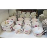 A Portmerion Gingko pattern dinner service consisting:- eight dinner plates, eight purple dinner