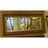 A gilt framed wide mirror 48”w x 20”h