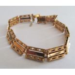 A 15ct gold bracelet with decorative rectangular link 18cm length approx 15.5g