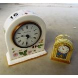 A Halcyon Days Buckingham Palace clock and a Wedgwood clock (both boxed)
