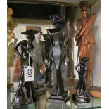 A resin model lady golfer and other figures