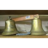 A repro brass ship's bell Titanic 1912 and an MS Bremen bell