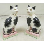 A pair of Victorian Staffordshire cats 7” high (both a/f) and a smaller pair 4” high
