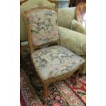 A walnut fauteuil on cabriole legs