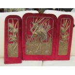 An Arts & Crafts embossed brass and velvet backed three fold screen (s/a/f), central motif of a