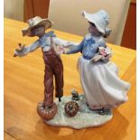 A Lladro figure Scarecrow and The Lady NO 5385 retired 1996 modelled by Regino Torrijos