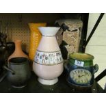 A tall Bretby oriental style vase and other vases