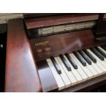 An Evestaff mini piano