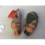 Two Bossons wall masks military