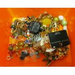 Various costume jewellery in orange jacobs box