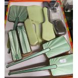 A five piece silver and green enamel brush and mirror set and various other dressing table items