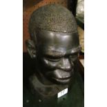 A carved African male head