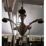 A brass five branch down light ceiling light