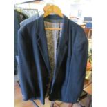 A navy cashmere gents jacket, a waistcoat and shirt