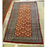 A green and red rug (a/f) 65” x 37” and small Bokhara rug 47” x 30”
