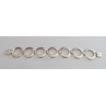 A silver linked circle design bracelet