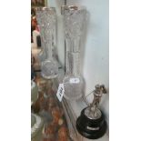 A pair of silver rimmed spill vases and a golf figure