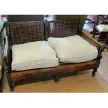 A single cane Bergere settee 54”