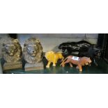 A pair of gilt lion bookends, three lion models and black panther (slightly a/f)
