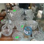 A glass basket and various other glass